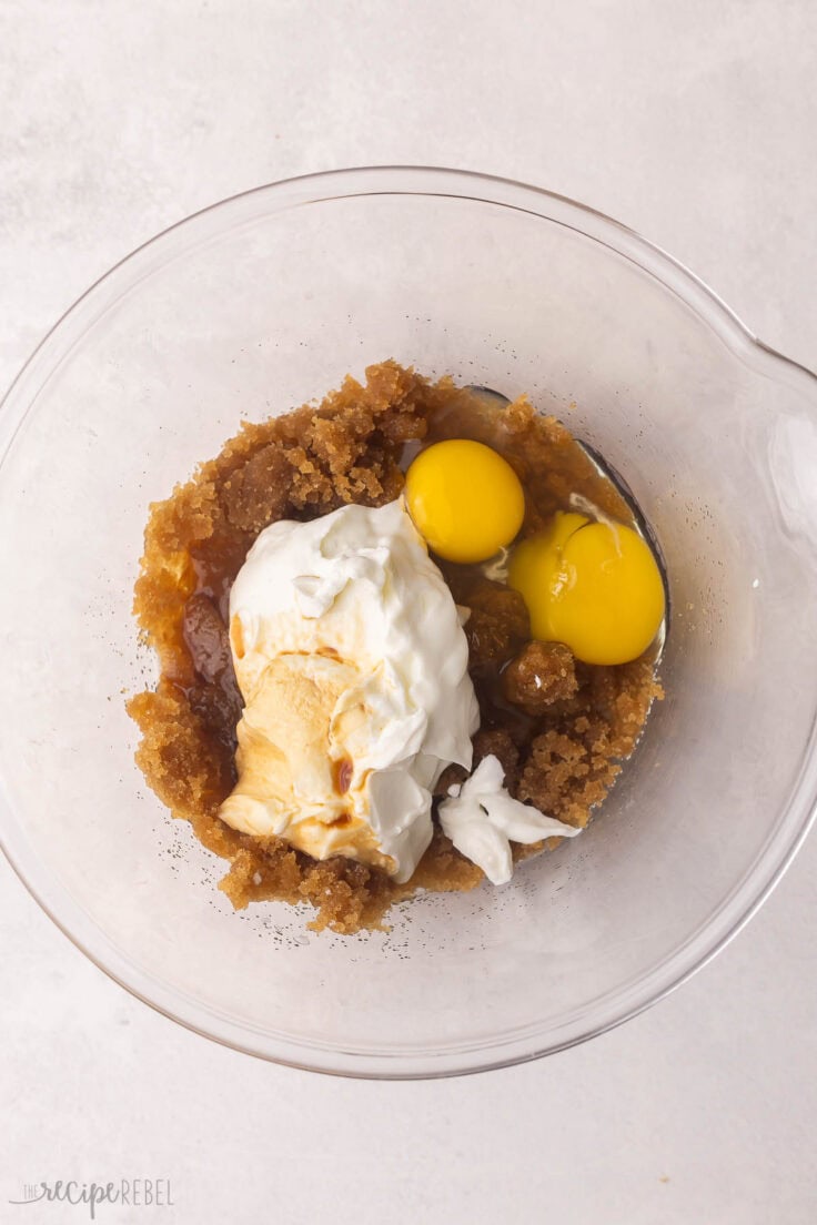 sugar fat and eggs in a glass mixing bowl.