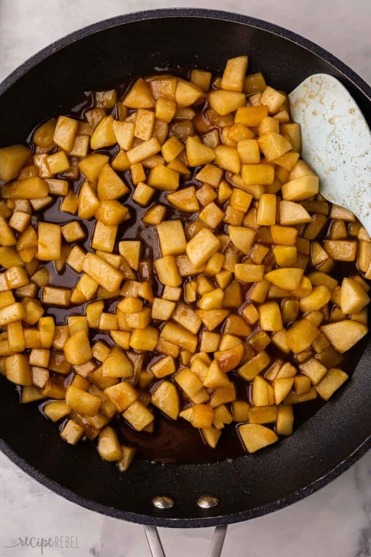 cooke apple filling in black pan.