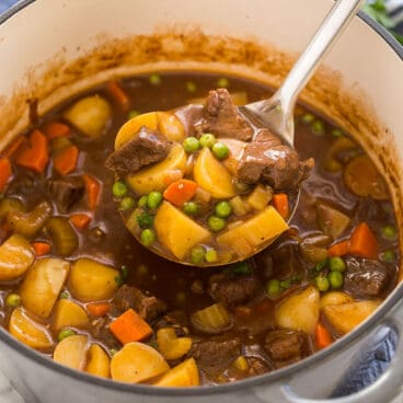 square image of a ladle scooping beef stew out of pot.