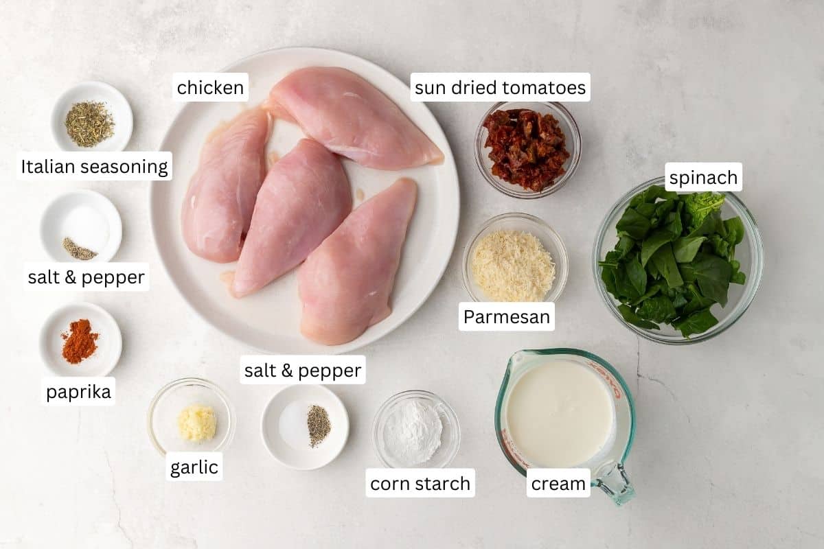 This Crockpot Tuscan Chicken features juicy chicken breasts slow cooked in a rich and flavorful cream sauce. This recipe takes just 10 minutes to prep and makes the perfect dinner served over your favorite pasta! #crockpot #slowcooker #recipe #dinner | dinner ideas | chicken recipes | chicken dinner | crockpot chicken | slow cooker chicken recipes | easy chicken breast recipes ingredients needed for crockpot tuscan chicken in bowls and plate.