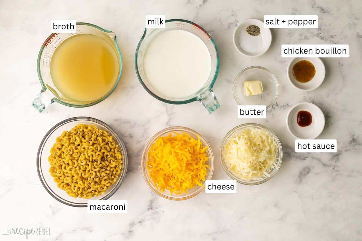 This Easy Homemade Mac and Cheese is super cheesy and creamy, made with a few ingredients all in one pot! Ready in 30 minutes or less, this stovetop mac is a family favorite. #dinner #recipe | macaroni and cheese | skillet mac and cheese | easy macaroni and cheese | comfort food | easy dinner recipes | one pot pasta ingredients needed for homemade mac and cheese in bowls.