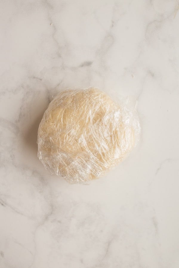 pie pastry wrapped in plastic wrap