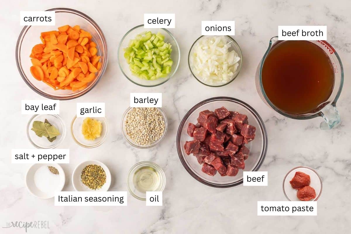 This Slow Cooker Beef Barley Soup is loaded with tender beef, barley, and vegetables simmering in a rich broth. It's the perfect crockpot meal for warming you up on a chilly day! #soup #recipe #dinner | soup recipes | beef recipes | comfort food | slow cooker soup | crockpot soups | crockpot meals | easy dinner ideas ingredients needed for slow cooker beef barley soup in bowls.